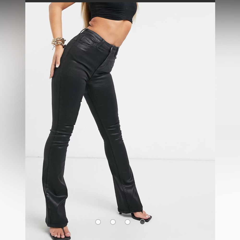 302. ASOS DESIGN Hourglass 'lift and contour' flare jeans in coated black SZ 25